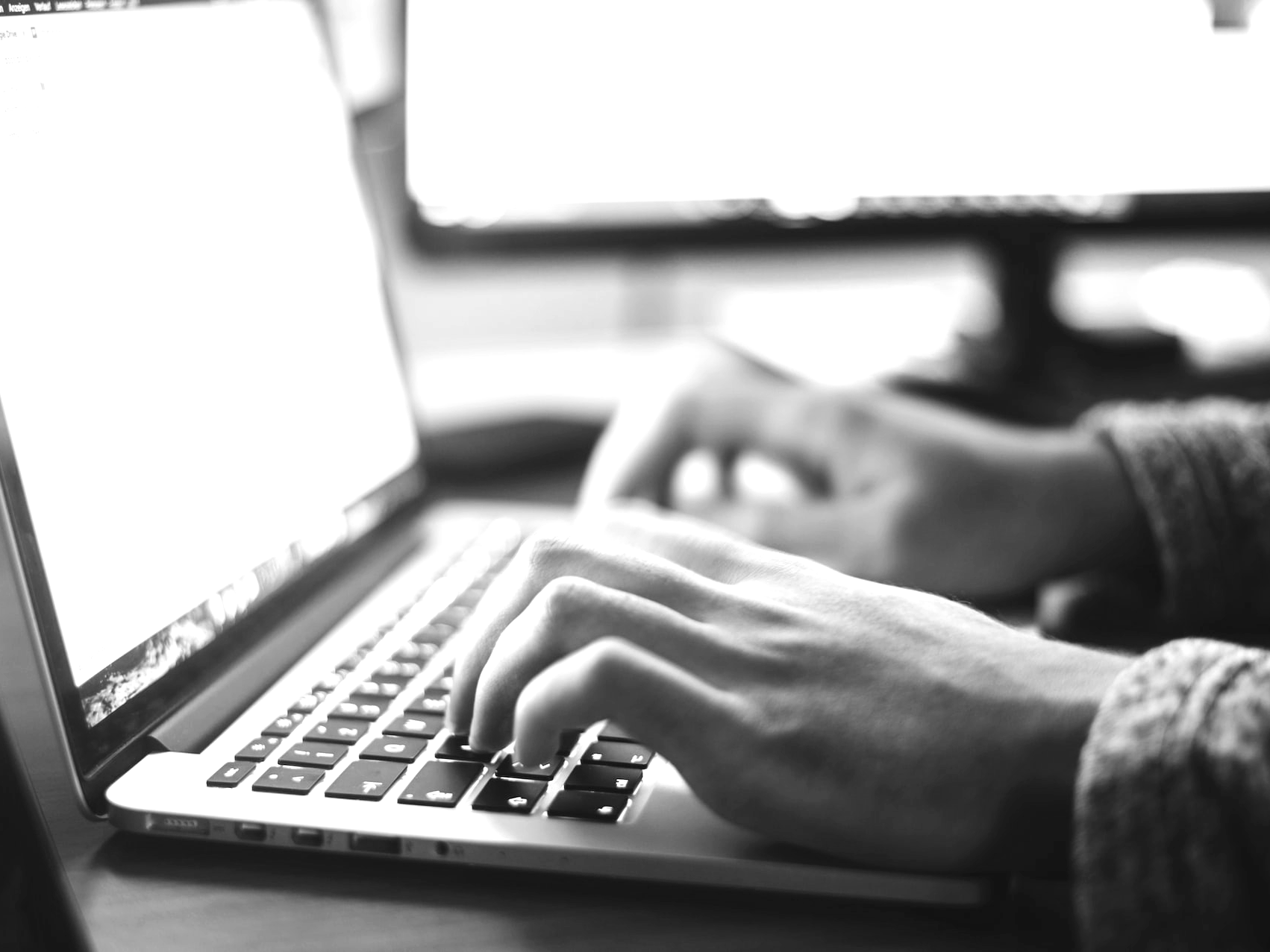 person using MacBook Pro